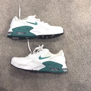White with green accents Air Maxes from Nike